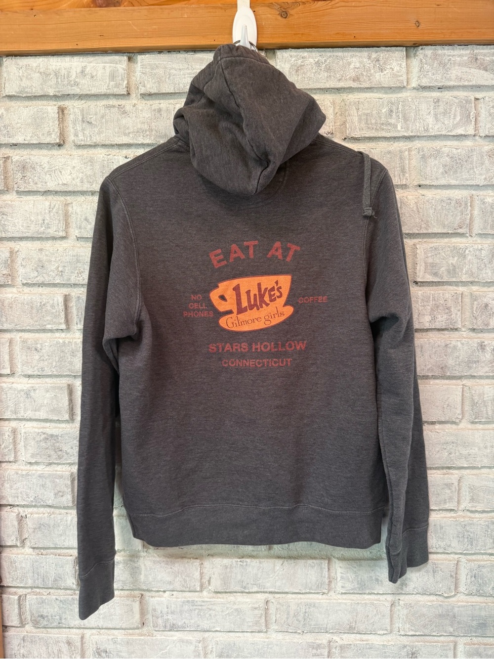 Gilmore Girls Port and Company Charcoal Hoodie with Orange Luke's Chest Logo